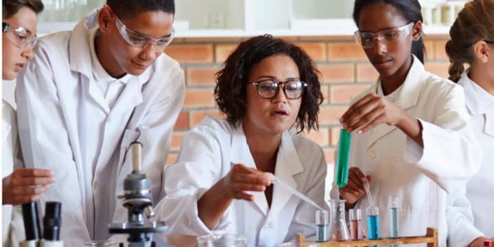 California State University, Stanislaus, or Stanislaus State, chemistry students working together on an experiment