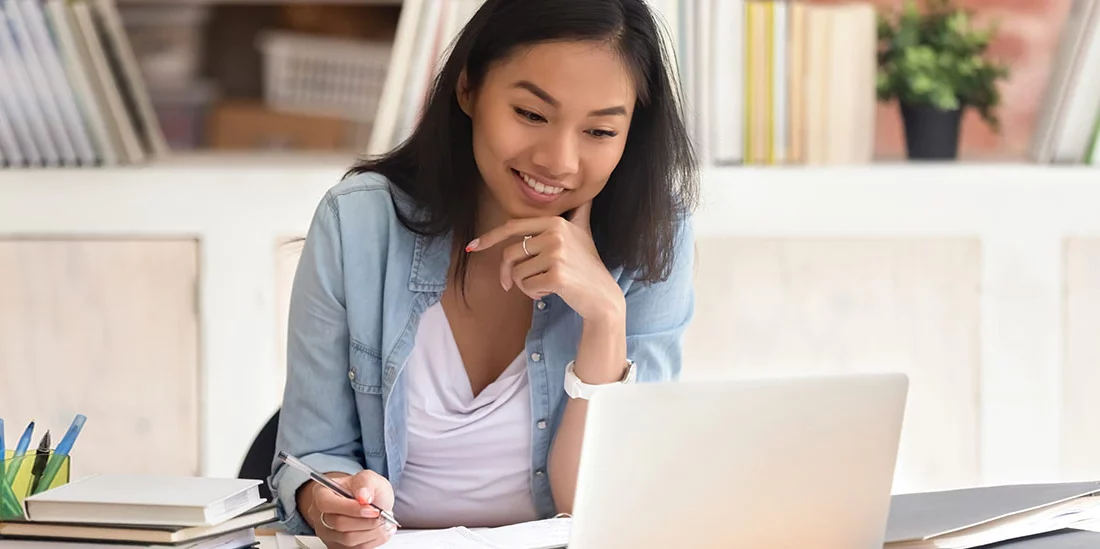 woman looking at computer