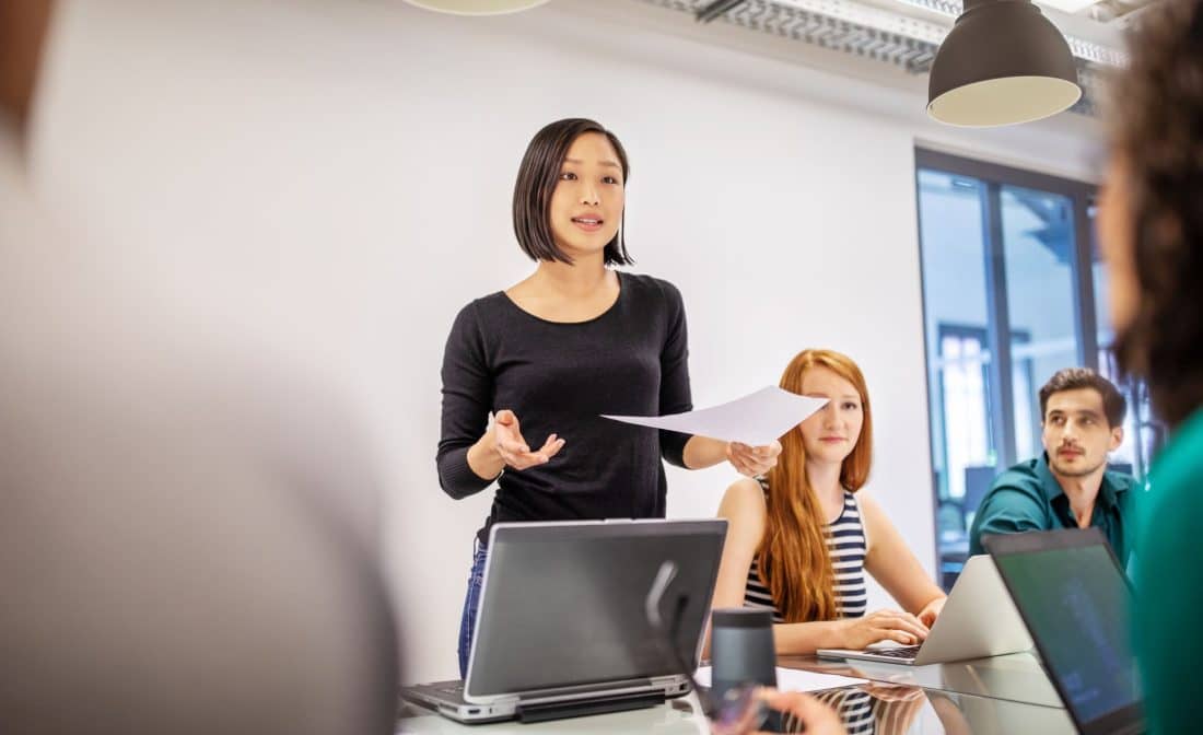 female business presenter in meeting