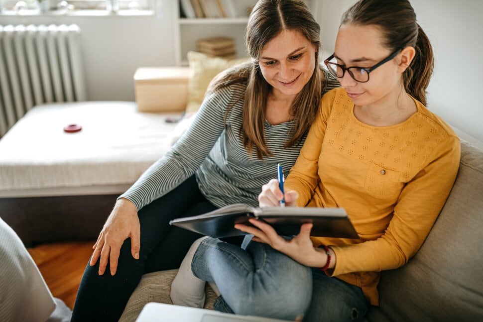 homeschool student sitting with parent