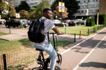 male student on bike