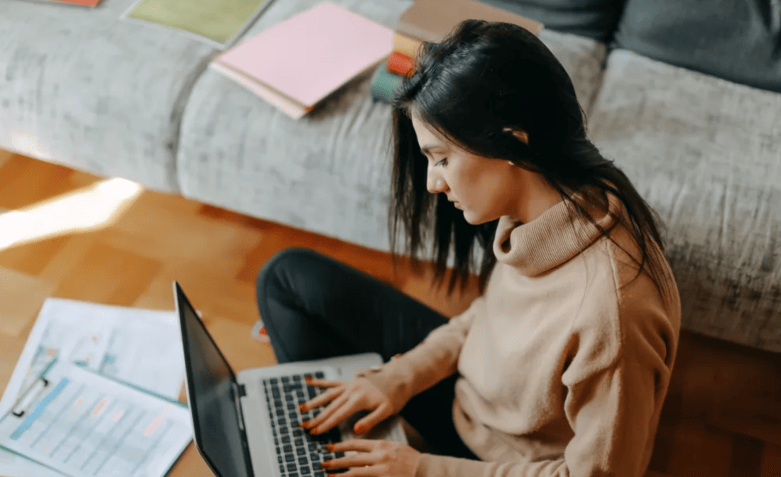 woman sitting at computer