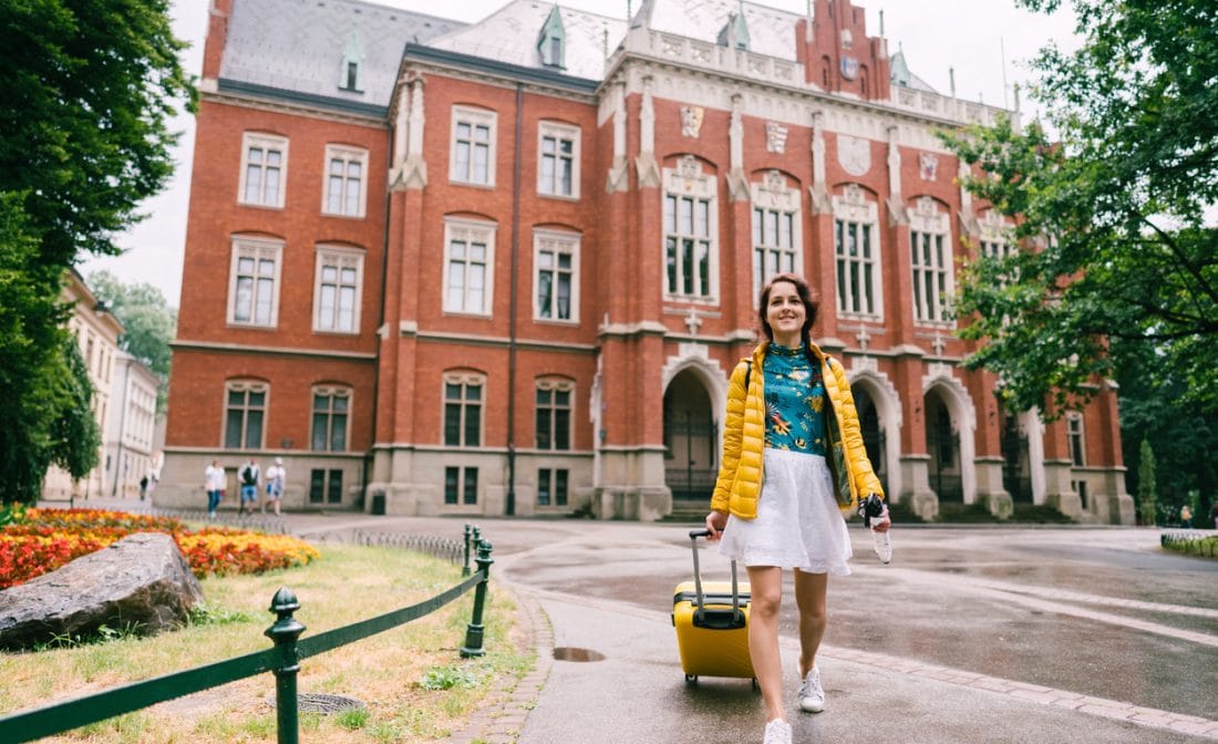 Students touring a college campus and learning what questions to ask during a college visit
